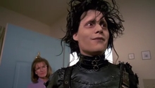 Edward Scissorhands (Johnny Depp) makes himself at home. Edward Scissorhands (Johnny Depp) makes himself at home.